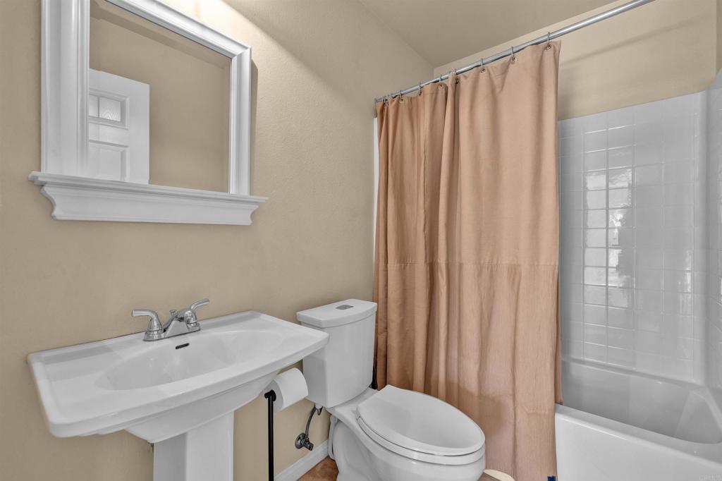 3486 Swinging V Road Borrego Springs, CA 92004 - Photo 11 of 41 a bathroom with a sink a toilet and shower