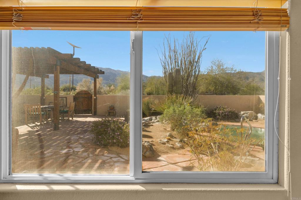 3486 Swinging V Road Borrego Springs, CA 92004 - Photo 12 of 41 a view of a glass door and a window