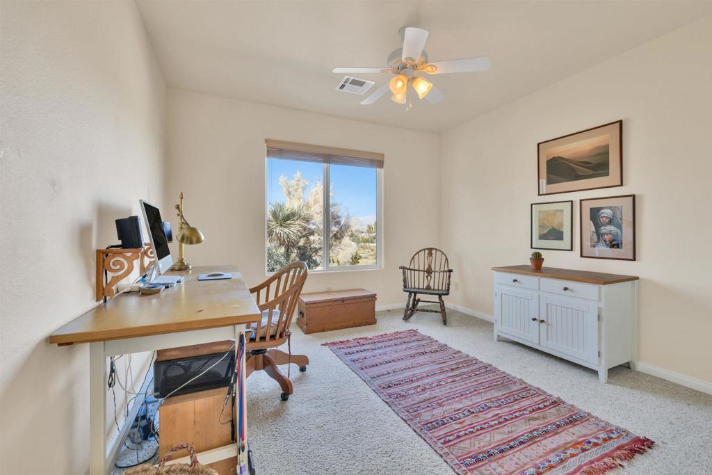 3486 Swinging V Road Borrego Springs, CA 92004 - Photo 19 of 41 a view of a workspace with furniture