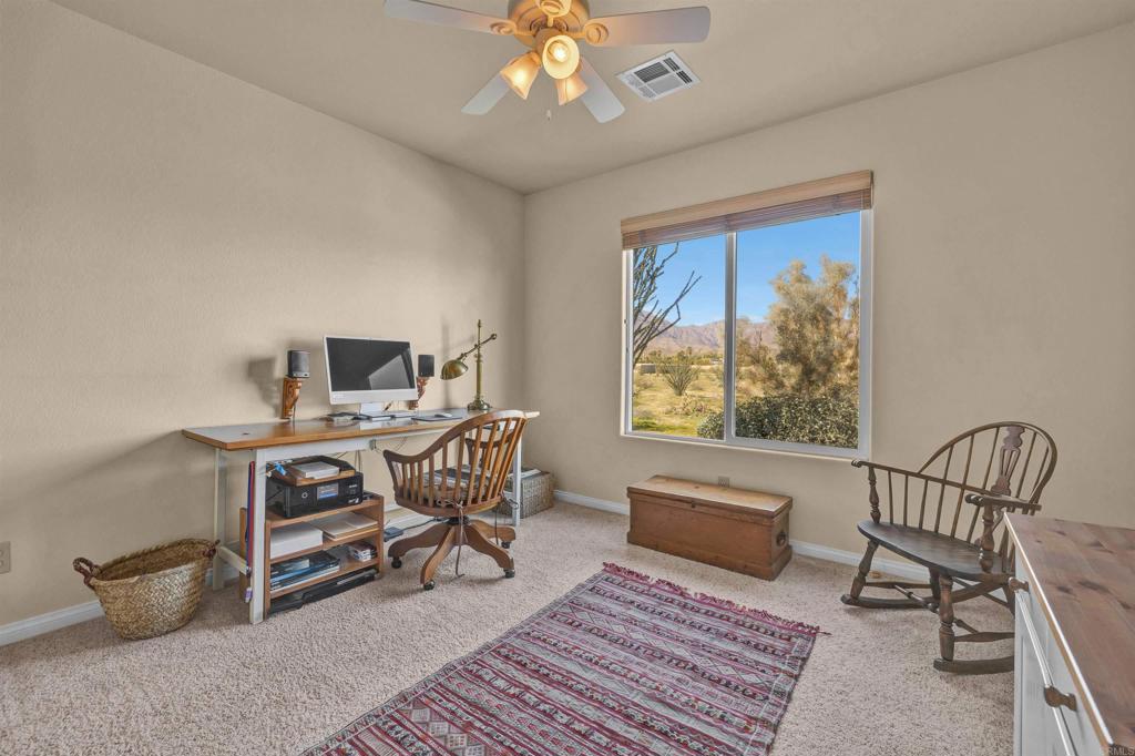 3486 Swinging V Road Borrego Springs, CA 92004 - Photo 20 of 41 a living room with furniture and a window