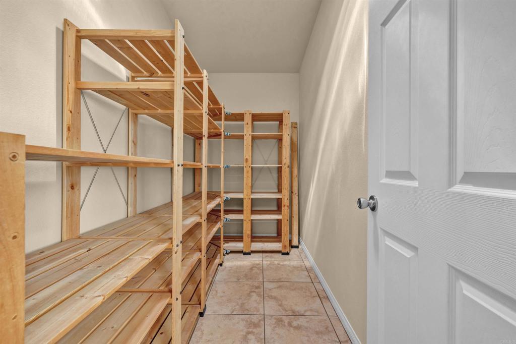 3486 Swinging V Road Borrego Springs, CA 92004 - Photo 28 of 41 a view of walk in closet with empty racks