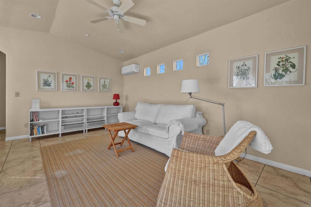 3486 Swinging V Road Borrego Springs, CA 92004 - Photo 29 of 41 a living room with furniture and a wooden floor