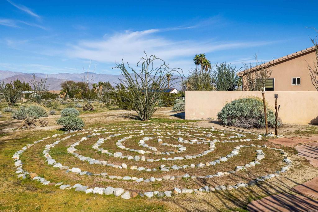 3486 Swinging V Road Borrego Springs, CA 92004 - Photo 30 of 41 a view of a yard with a tree