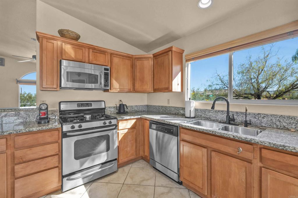 3486 Swinging V Road Borrego Springs, CA 92004 - Photo 3 of 41 a kitchen with cabinets appliances and a sink