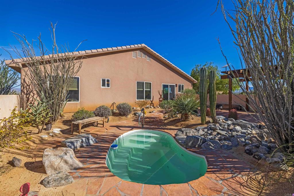 3486 Swinging V Road Borrego Springs, CA 92004 - Photo 32 of 41 a view of a backyard with plants and patio