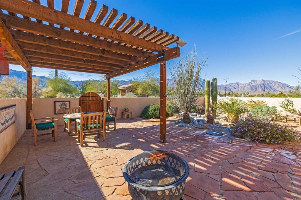 3486 Swinging V Road Borrego Springs, CA 92004 - Photo 38 of 41 a view of a patio with a table chairs and a patio