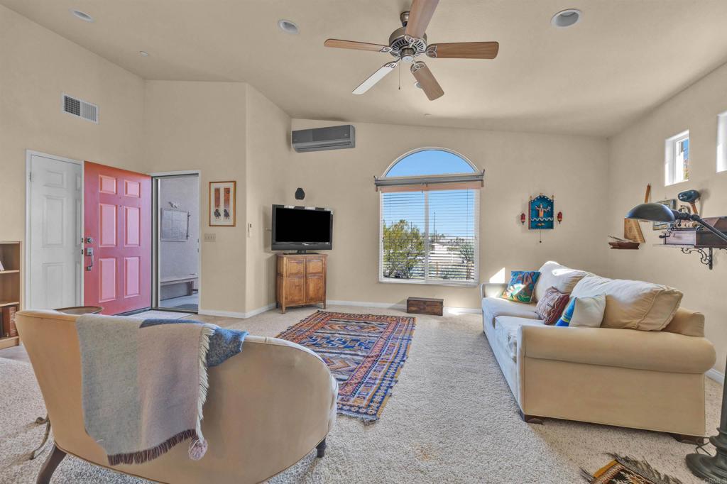 3486 Swinging V Road Borrego Springs, CA 92004 - Photo 5 of 41 a living room with furniture and a flat screen tv