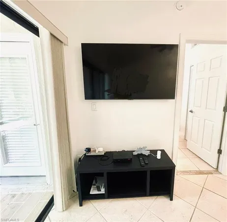 a view of balcony with furniture