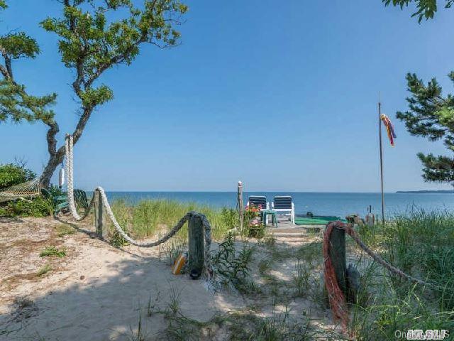 562 Long Beach Road Nissequogue, NY 11780 - Photo 1 of 1 a view of a swimming pool with a patio