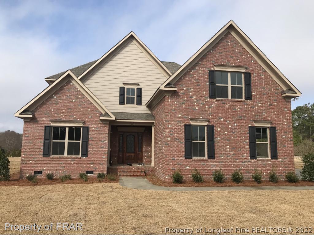 800 South River Road Stedman, NC 28391 - Photo 1 of 23 a front view of a house with a yard
