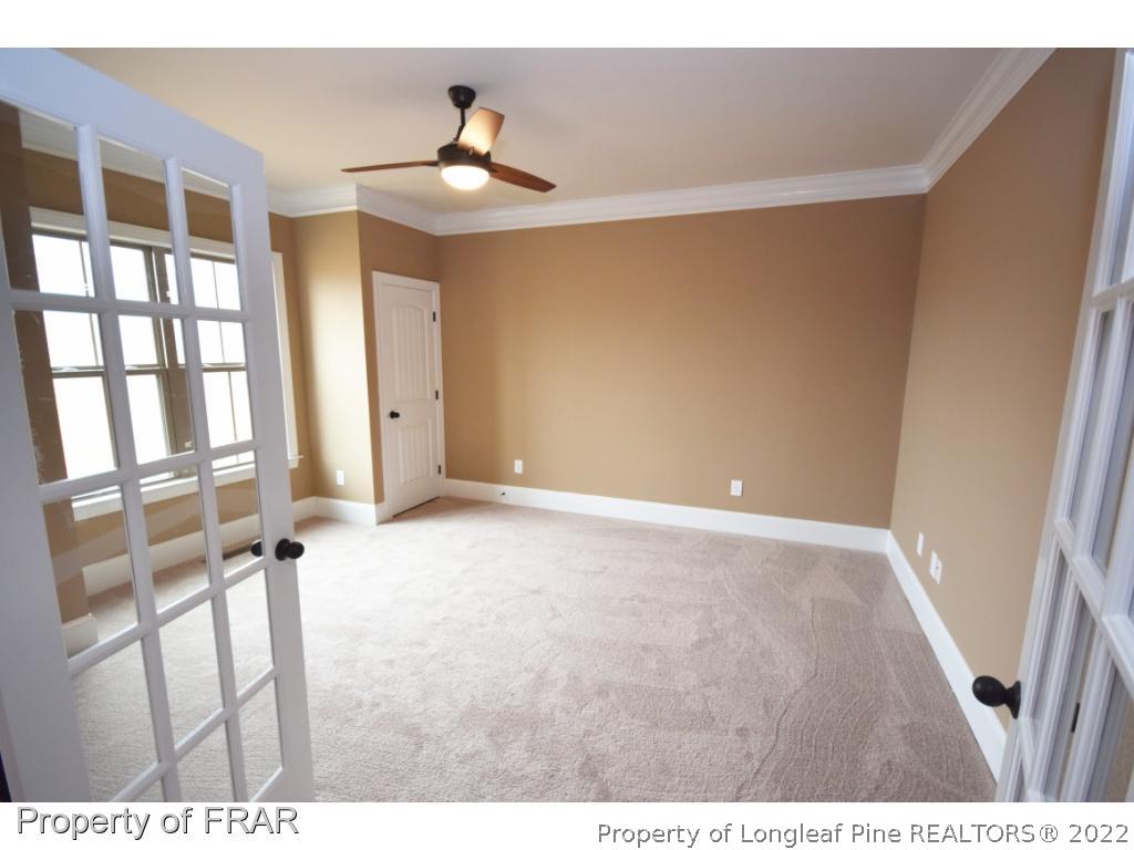 800 South River Road Stedman, NC 28391 - Photo 11 of 23 a view of an empty room with a window