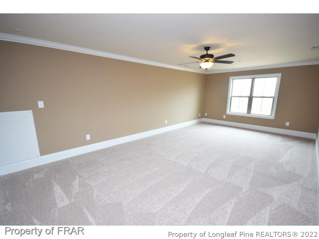 800 South River Road Stedman, NC 28391 - Photo 14 of 23 a view of an empty room with a window