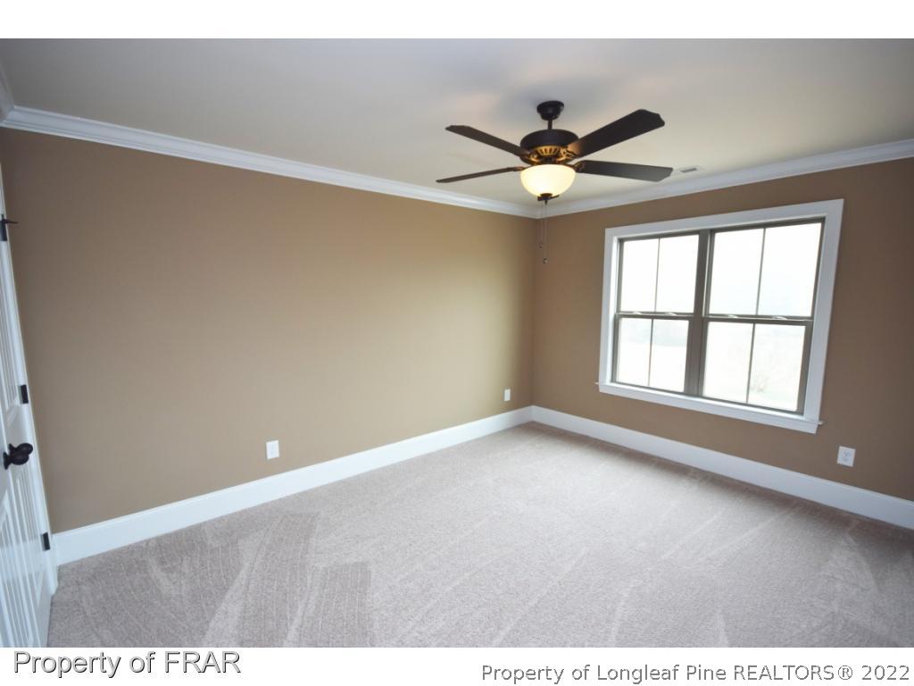 800 South River Road Stedman, NC 28391 - Photo 15 of 23 a view of an empty room with a window