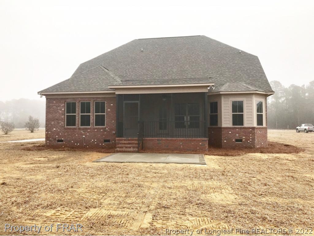 800 South River Road Stedman, NC 28391 - Photo 23 of 23 a house that has a tree in front of it