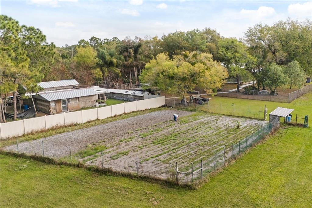 2270 Old Hickory Tree Road St. Cloud, FL 34772 - Photo 12 of 40 a view of a swimming pool with a yard
