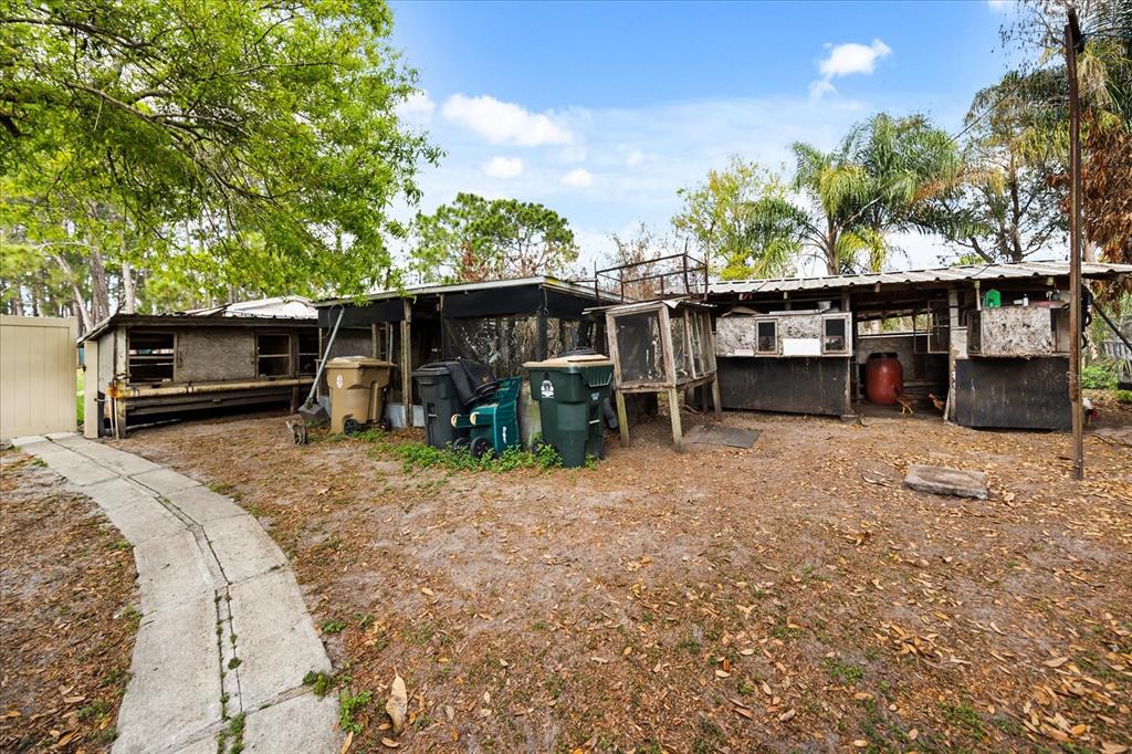 2270 Old Hickory Tree Road St. Cloud, FL 34772 - Photo 36 of 40 a view of a backyard with furniture and trees
