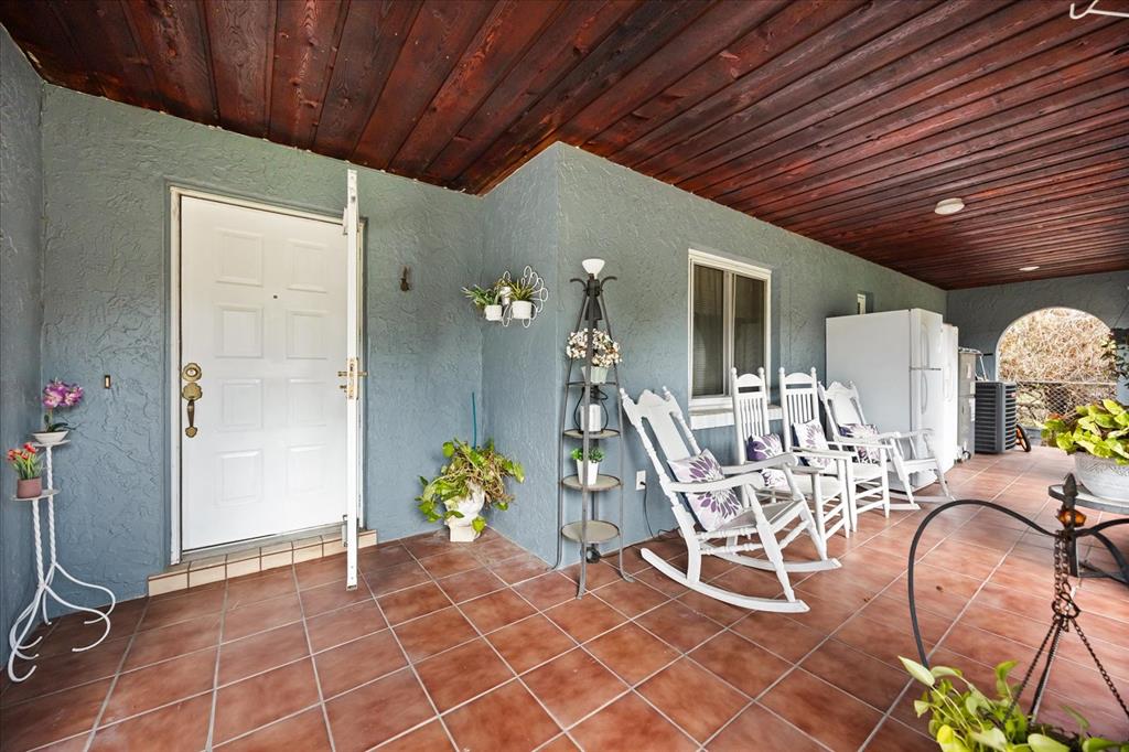 2270 Old Hickory Tree Road St. Cloud, FL 34772 - Photo 37 of 40 a dining room with furniture and a chandelier