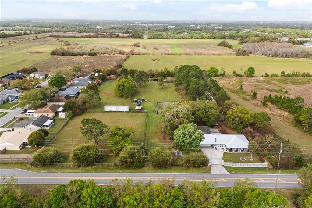 2270 Old Hickory Tree Road St. Cloud, FL 34772 - Photo 5 of 40 an aerial view of ocean with residential house and outdoor space
