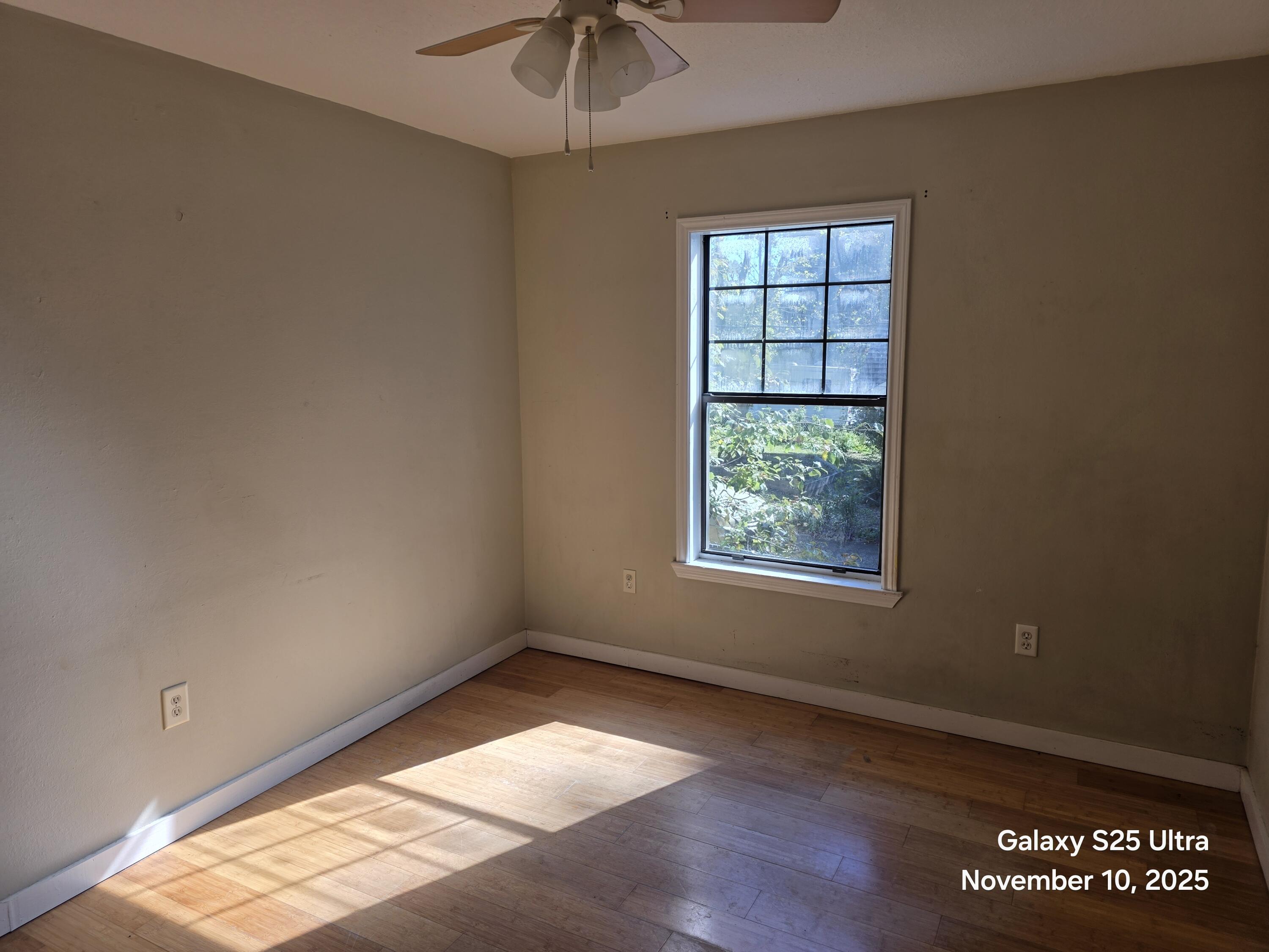 168 Ridge Lake Road Crestview, FL 32536 - Photo 5 of 11 an empty room with a window