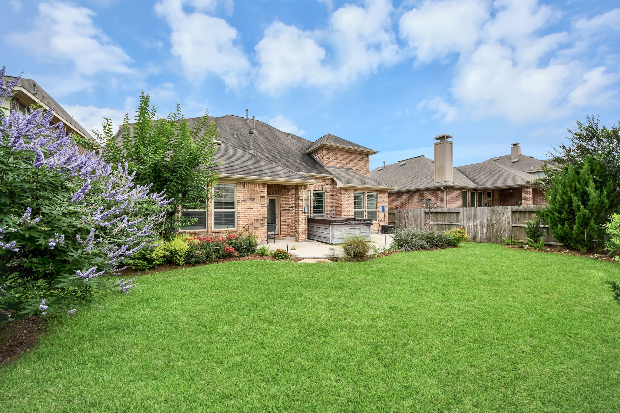 2811 Hadley Springs Lane Spring, TX 77386 - Photo 48 of 50 a front view of a house with a garden and pathway