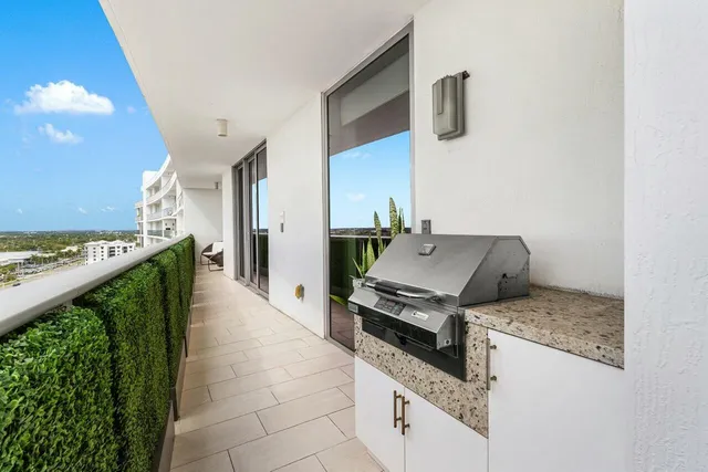 a kitchen with stainless steel appliances granite countertop a stove and a sink
