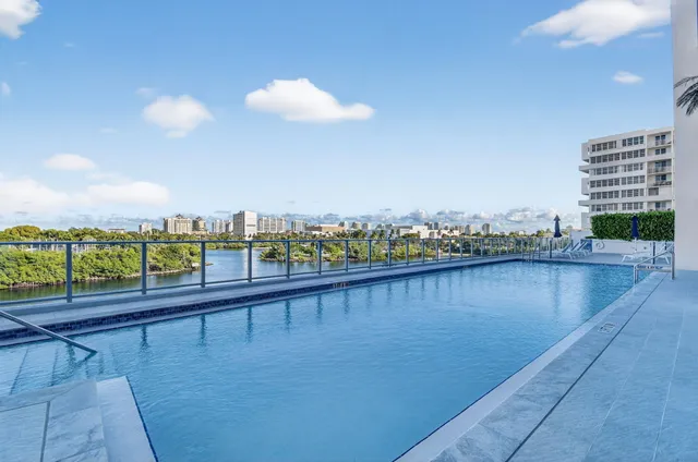 a view of swimming pool with outdoor seating