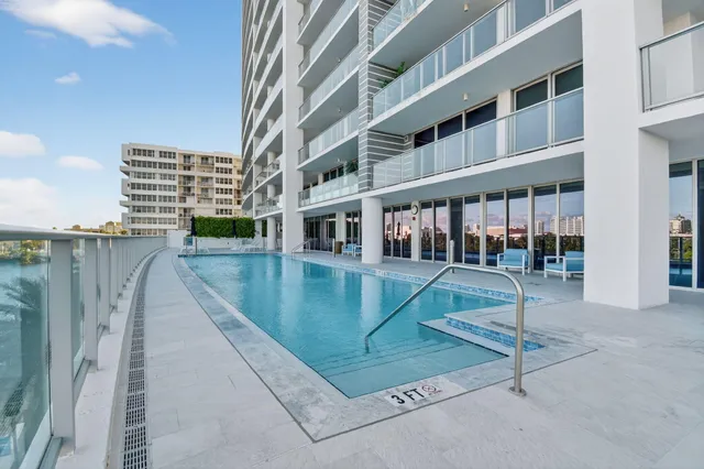 a view of a building with a swimming pool