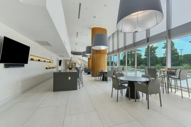 a view of a living room and dining room