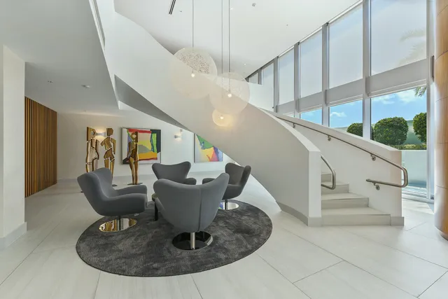 a view of entryway and hall with dining room