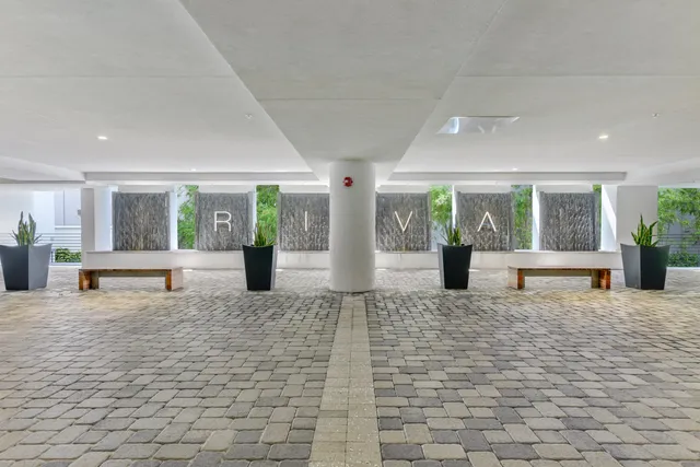 a view of a living room and entryway