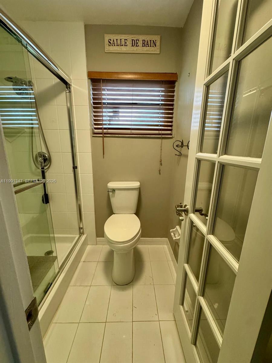2505 Southwest 126th Avenue Miami, FL 33175 - Photo 19 of 22 a bathroom with a toilet and a shower