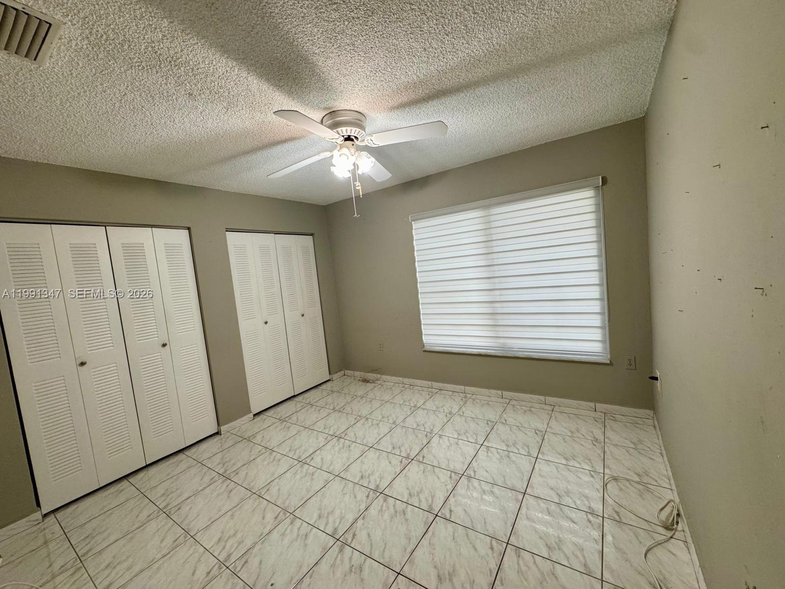 2505 Southwest 126th Avenue Miami, FL 33175 - Photo 20 of 22 a view of an empty room with a window
