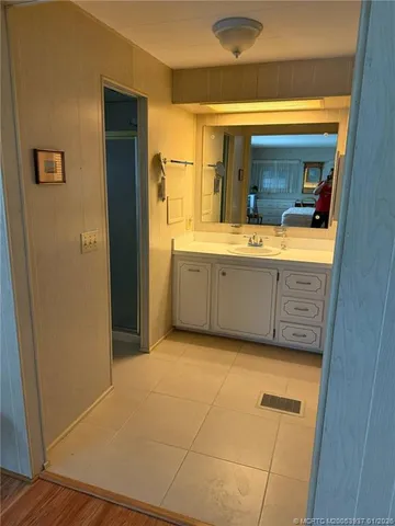 a view of a bathroom with a tub and a sink