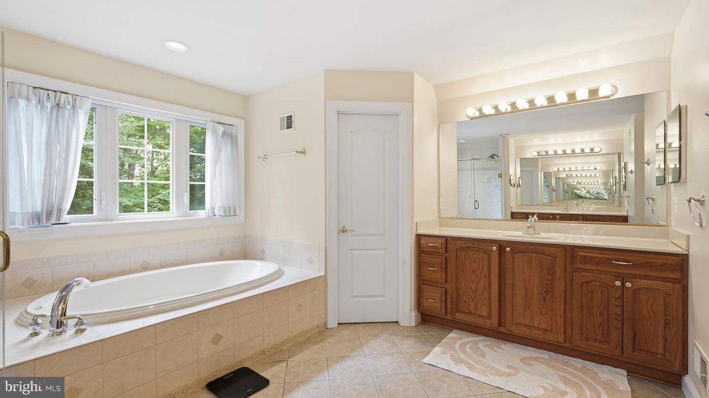 13301 Dumfries Road Manassas, VA 20112 - Photo 41 of 49 Serene bathroom with natural light.