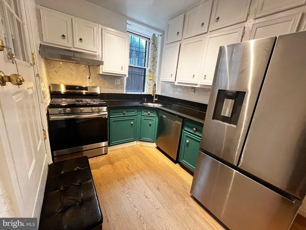 3014 Dent Place Northwest, Unit 4E Washington, DC 20007 - Photo 2 of 14 Charming kitchen with everything you need.