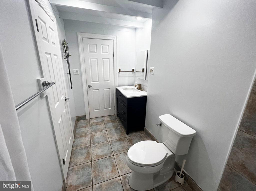 3014 Dent Place Northwest, Unit 4E Washington, DC 20007 - Photo 8 of 14 Updated bathroom, with storage closet