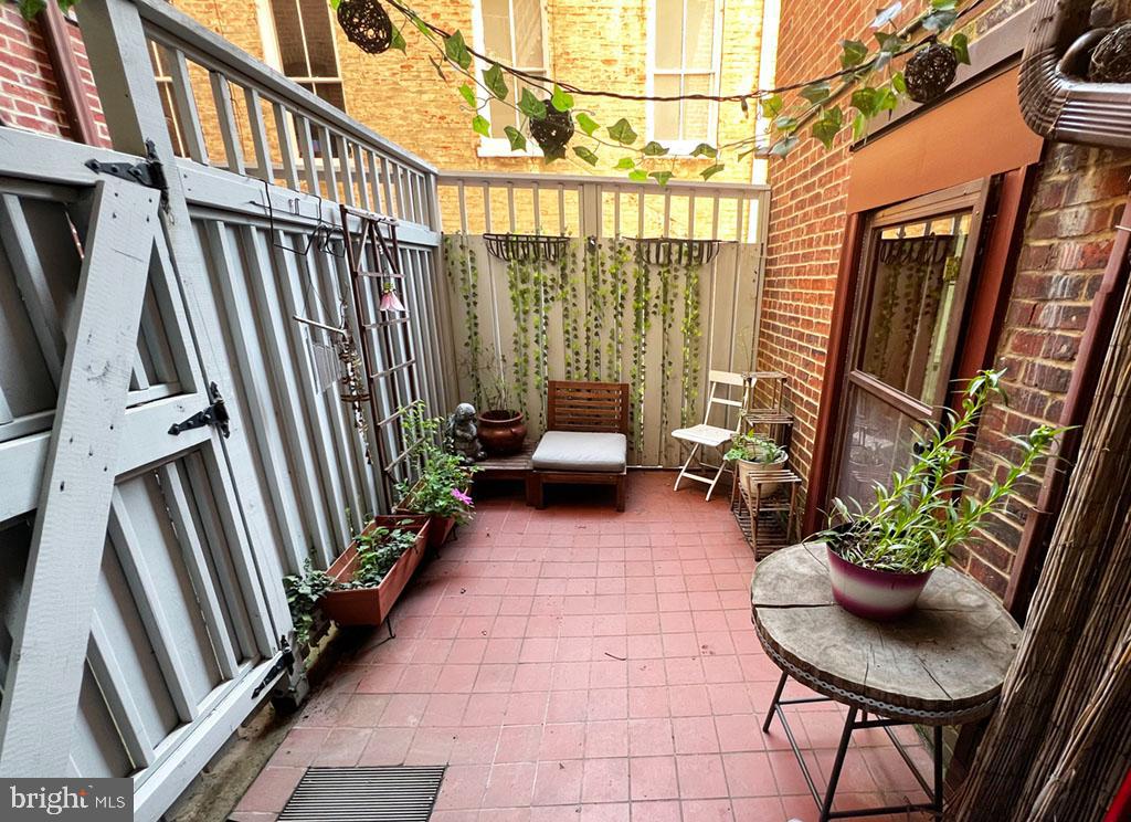 3014 Dent Place Northwest, Unit 4E Washington, DC 20007 - Photo 10 of 14 Private patio off the kitchen, with alley access