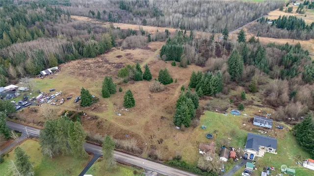 a view of a lake with a yard