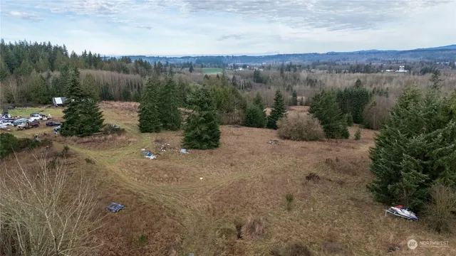 a view of a lake with mountain in the background
