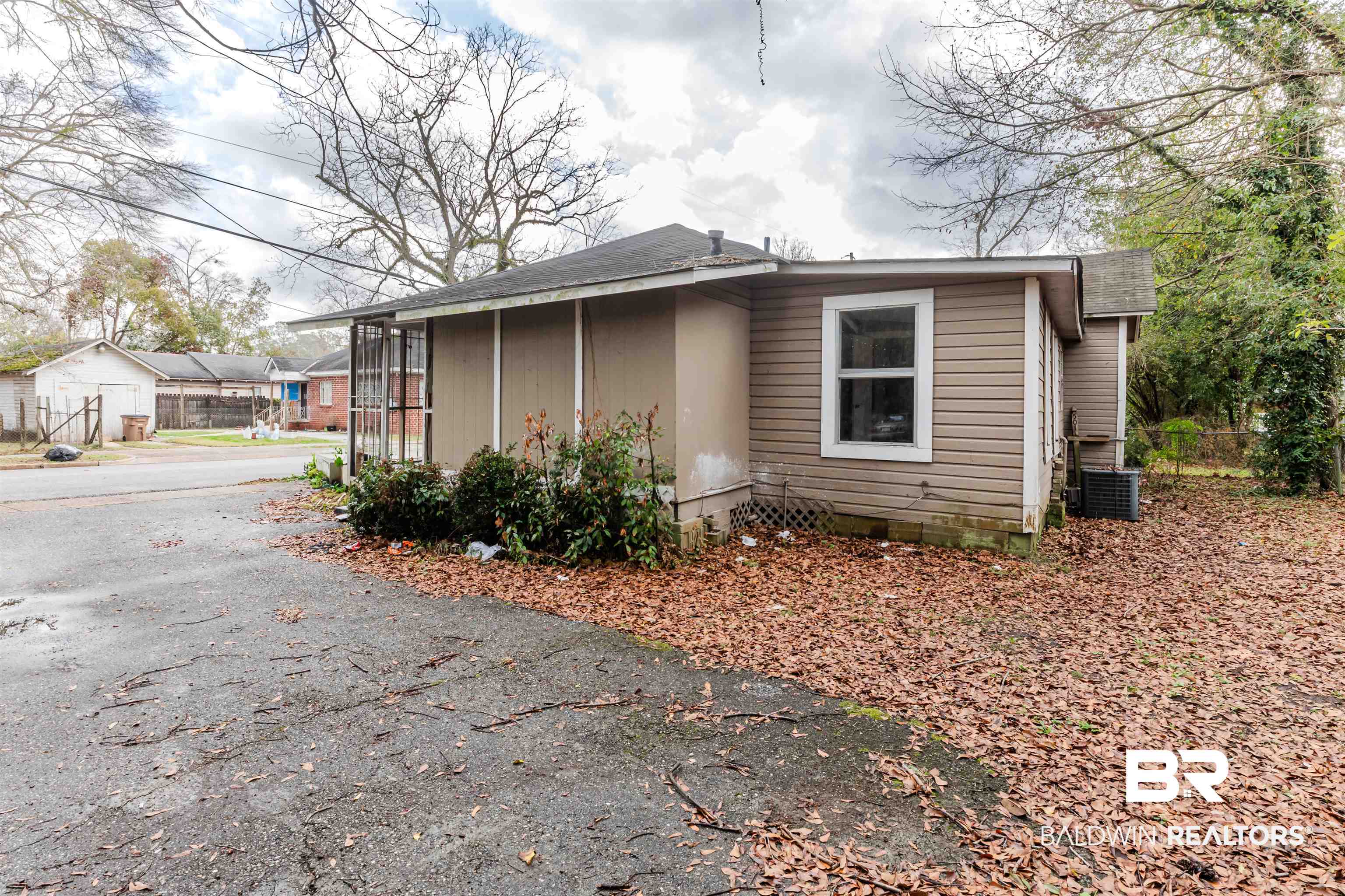 600 Mohawk Street Mobile, AL 36606 - Photo 5 of 20 View of property exterior featuring cooling unit
