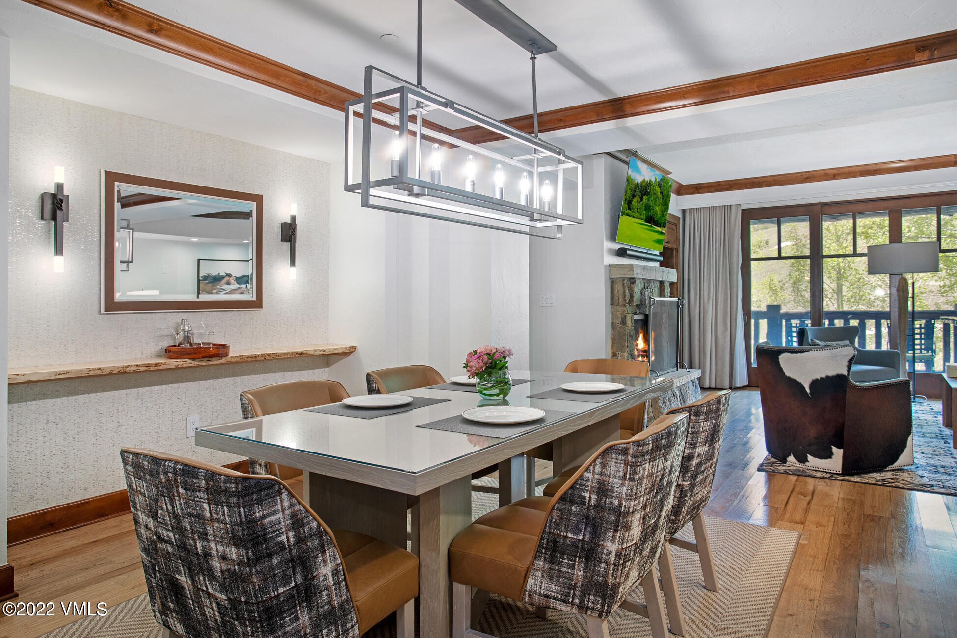 100 Bachelor Ridge Road, Unit 3402 Avon, CO 81620 - Photo 5 of 54 a view of a dining room with furniture window and outside view