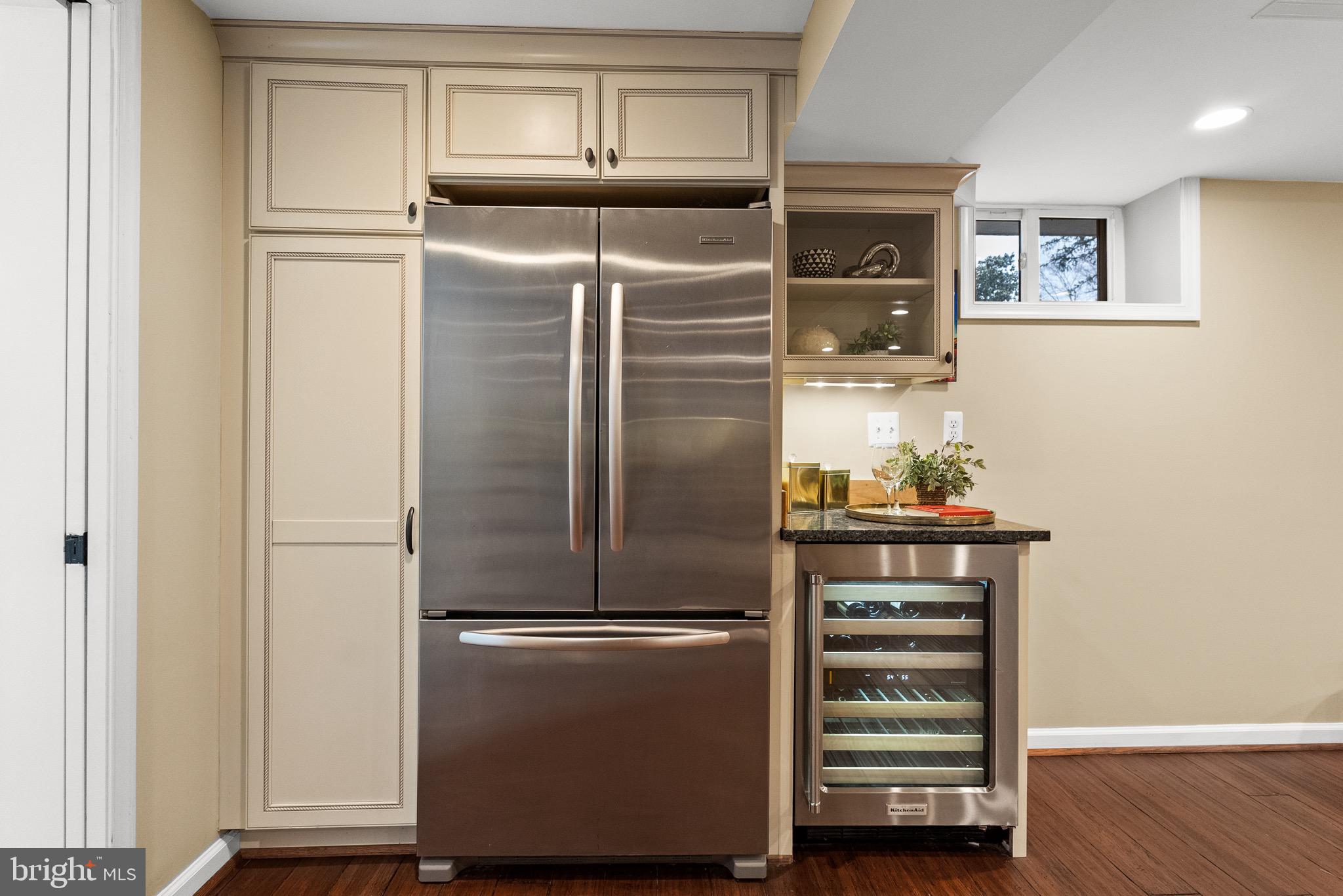 7911 Bainbridge Road Alexandria, VA 22308 - Photo 35 of 50 Custom built ins with refrigerator/beverage frig