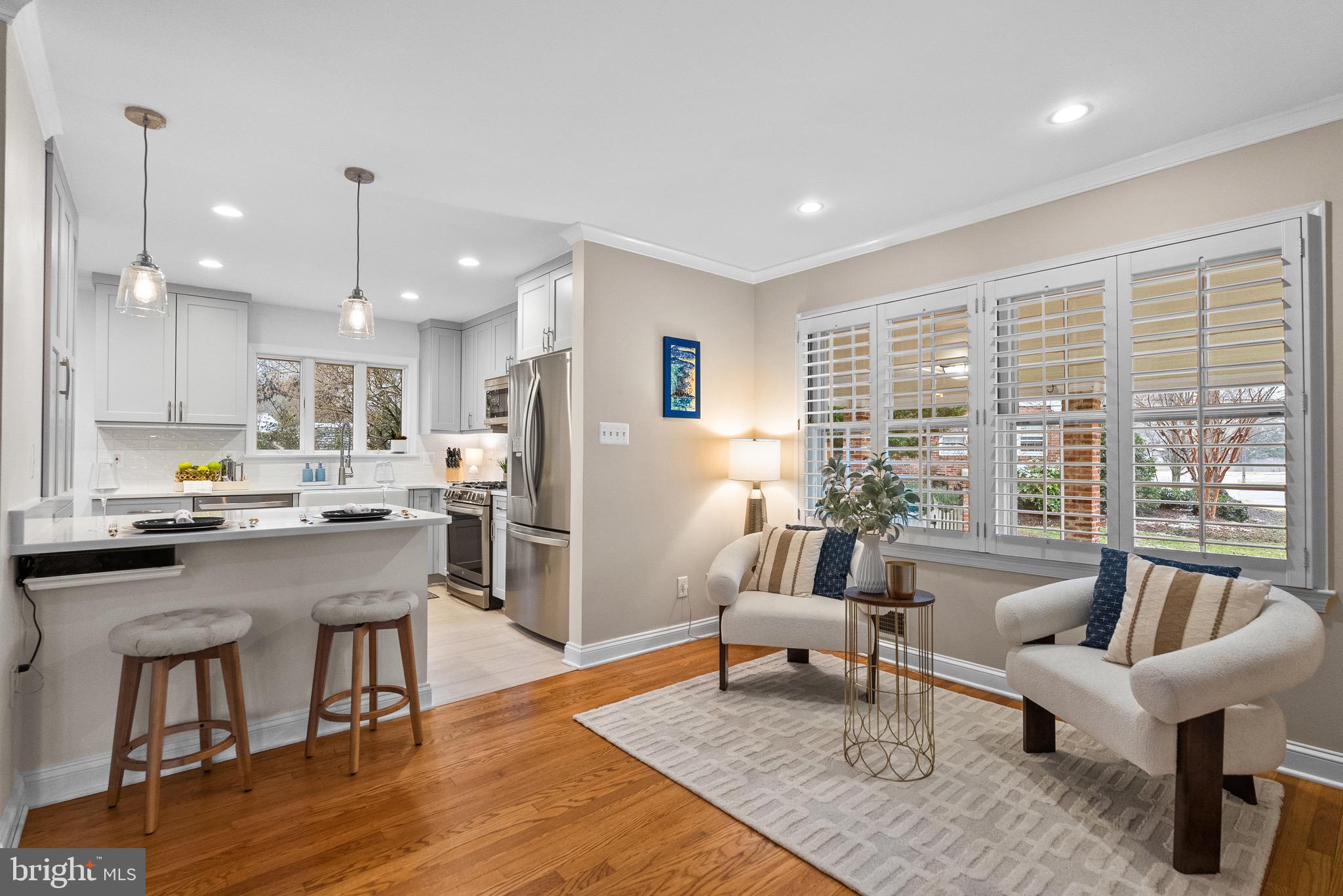 7911 Bainbridge Road Alexandria, VA 22308 - Photo 9 of 50 Living space leads directly to the kitchen