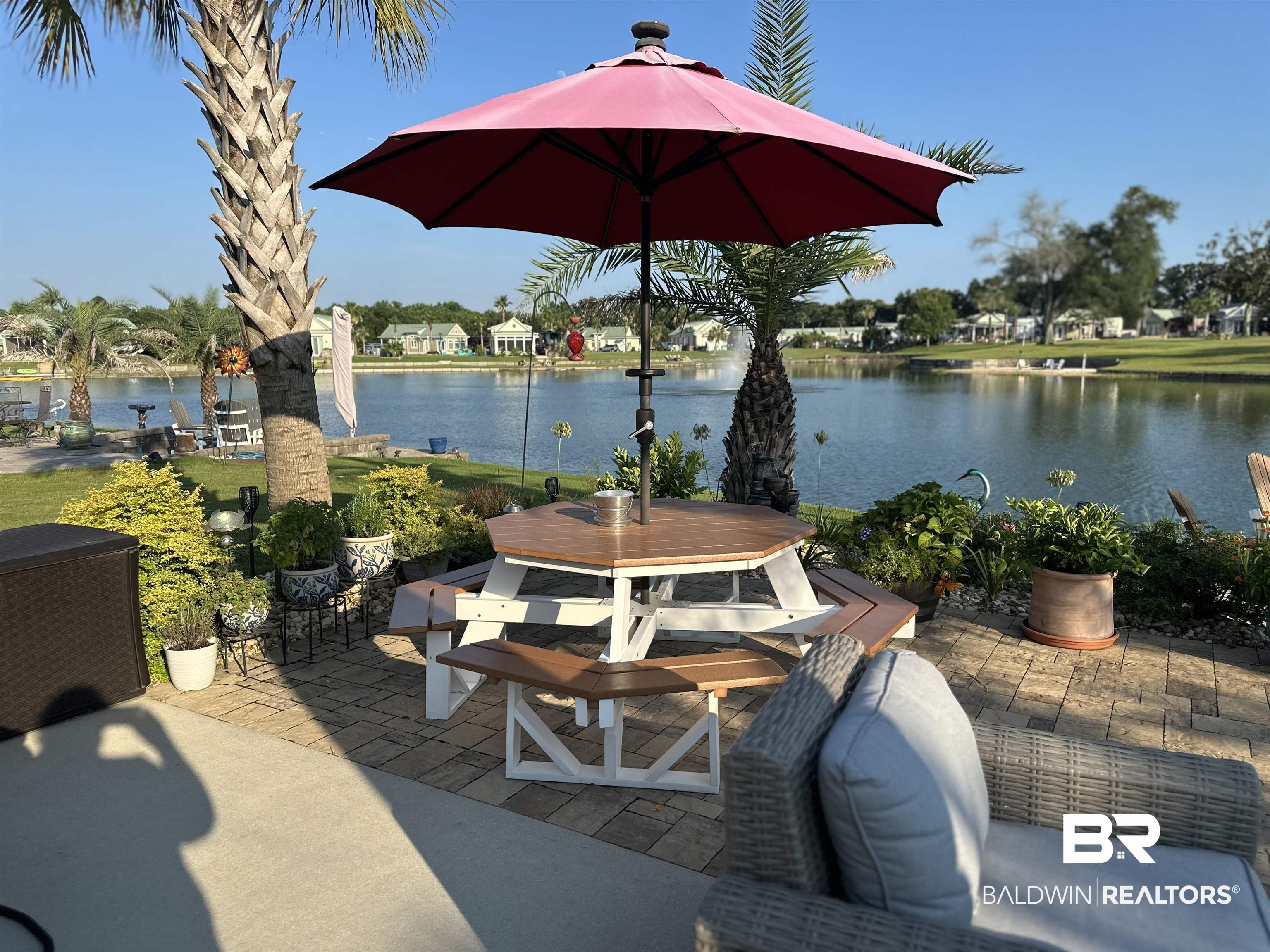 28170 Migratory Way Elberta, AL 36530 - Photo 4 of 37 View of patio with a water view