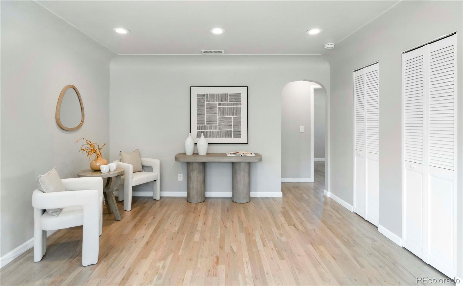 1310 Wolff Street Denver, CO 80204 - Photo 31 of 31 a view of a room with wooden floor and furniture