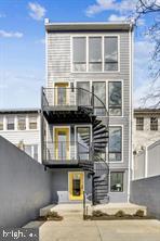 822 Madison Street Northwest Washington, DC 20011 - Photo 35 of 35 a front view of a house with a yard