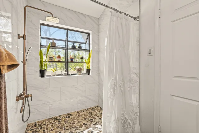 a view of a house with a large window