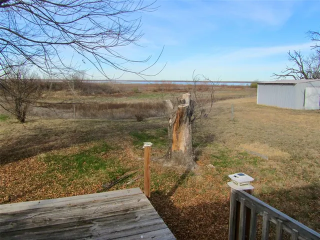 a view of a balcony with an ocean view