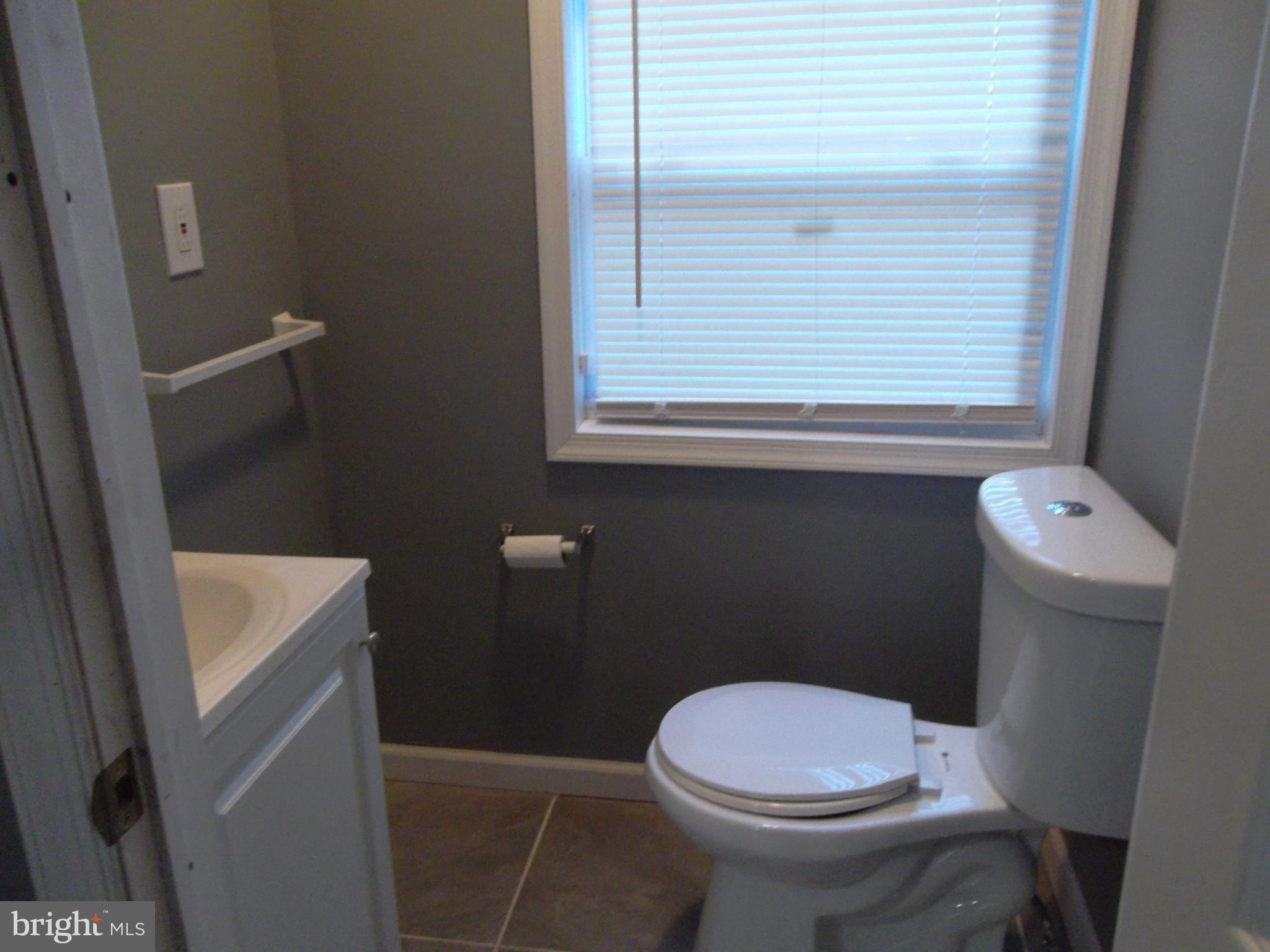 5037 Griscom Street Philadelphia, PA 19124 - Photo 3 of 6 1st Floor Half Bathroom