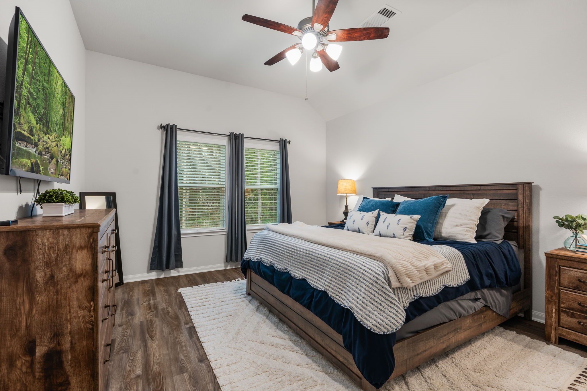 16680 Rockwall Street Conroe, TX 77303 - Photo 17 of 38 Primary Bedroom located off the living room.